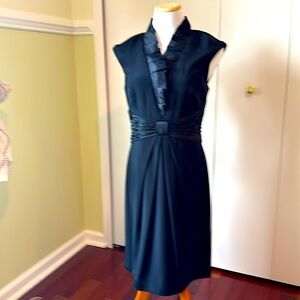 Black cocktail dress by Kay Unger size 10. Made of 100% silk.